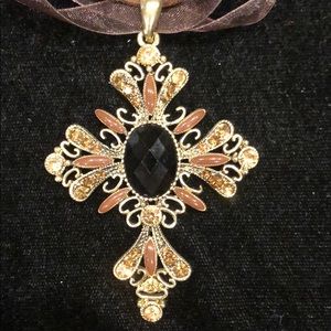 Good cross with brown crystals on organza ribbon.